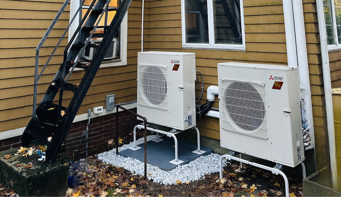 Ductless mini-split heat pump system with modern AC installation - Image 1